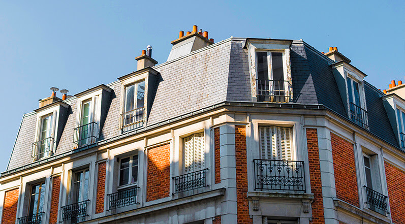 A Building With a Mansard Roof