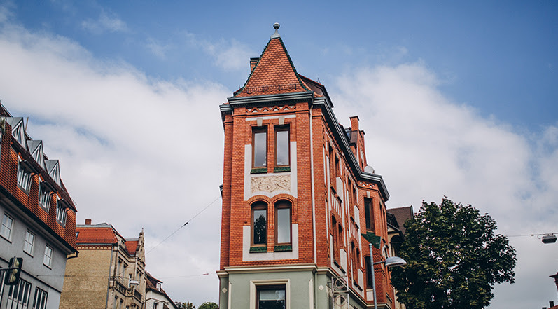 A Building With a Turret Roof