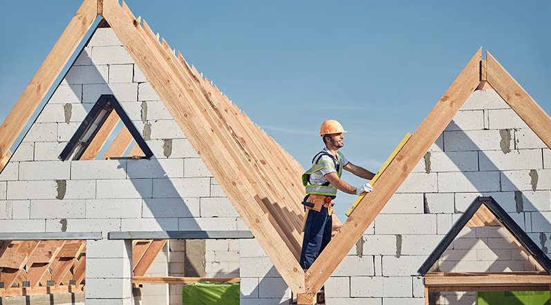 A Contractor Installing a New Roof