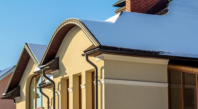 A Home With Snow on the Roof