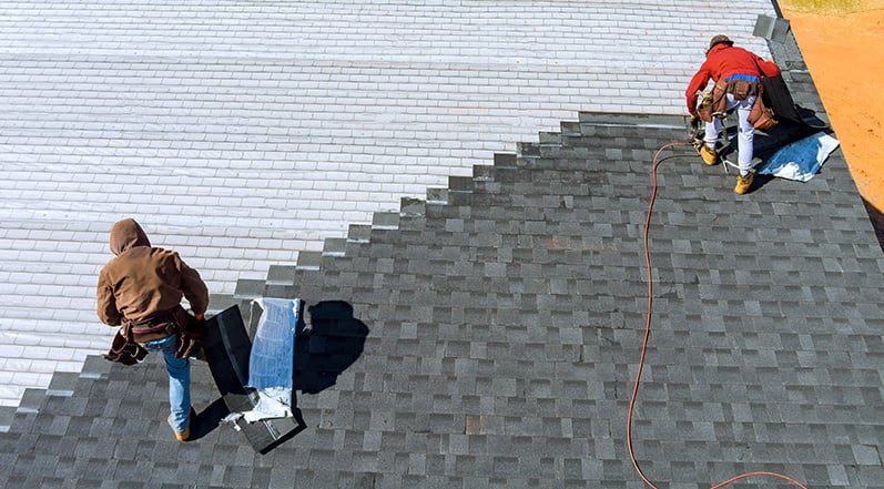 A Team Replacing a Roof