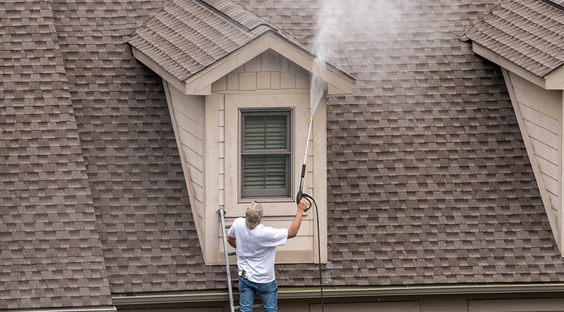 Applying a Cleaning Solution to a Roof