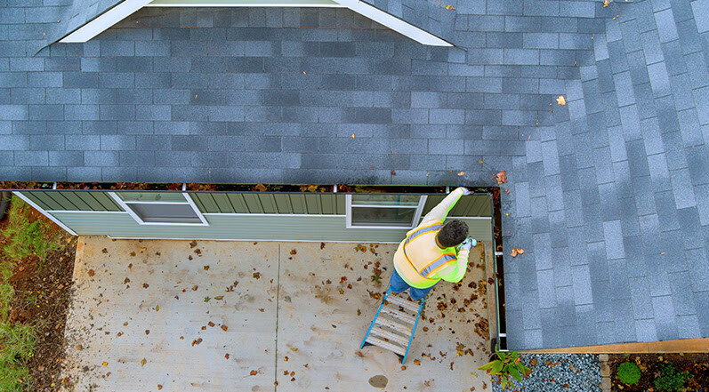 Cleaning Out Roof Gutters-1