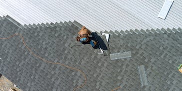 Contractor Installing Roof Shingles