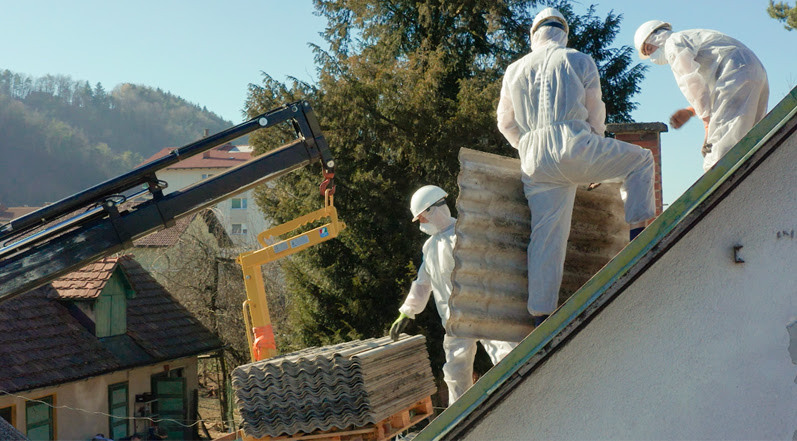 Professionals Replacing an Asbestos Roof