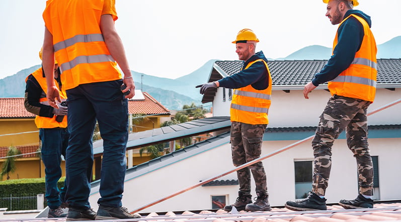Roofing Professionals Following Safety Precautions