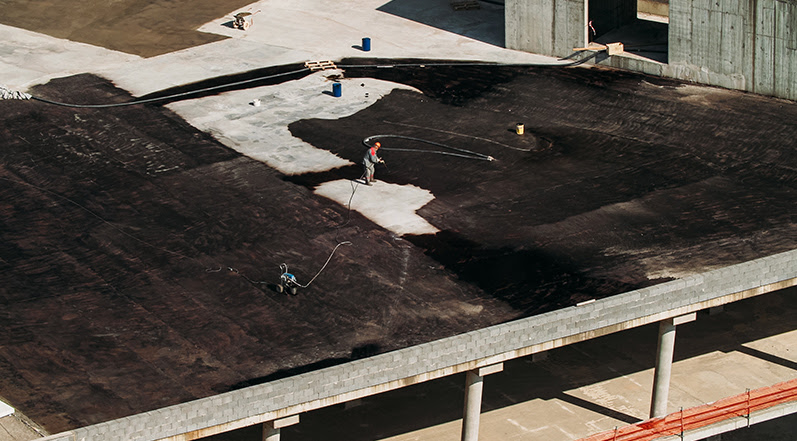 Ponding Water: Solutions for Flat Roof Drainage Issues