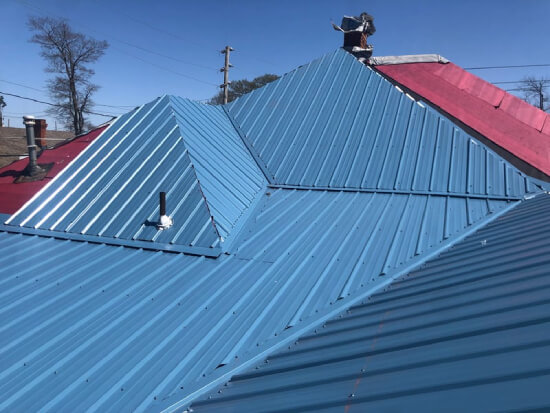 Picture of AG panel metal roof in powder blue color used to demonstrate how long a metal roof should last