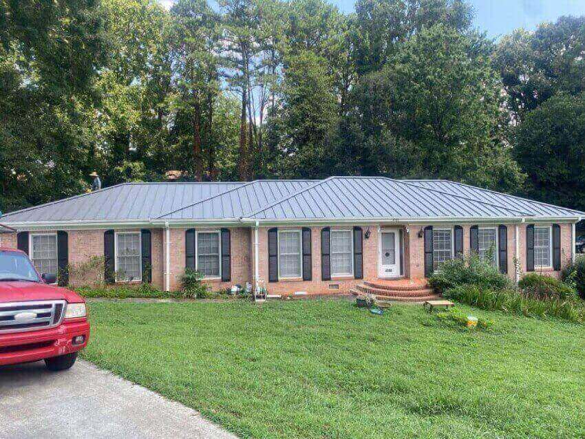 In this image, there is a well-installed, residential metal roof